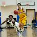 Huron senior Demetris Sims jumps to steal the ball from Ypsilanti junior Janeau Joubert in the second half of the game on Friday, March 8. Daniel Brenner I AnnArbor.com